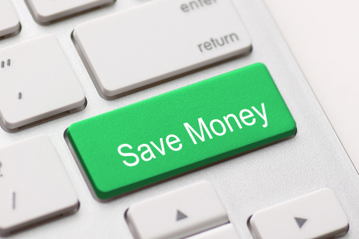 save money for investment concept with a green button on computer keyboard